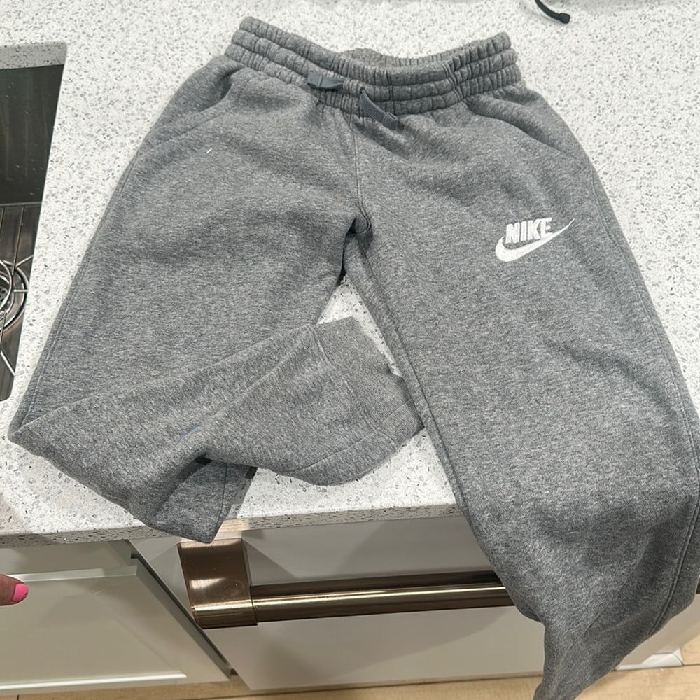 Can be Unisex- Grey- Nike joggers/sweatpants.